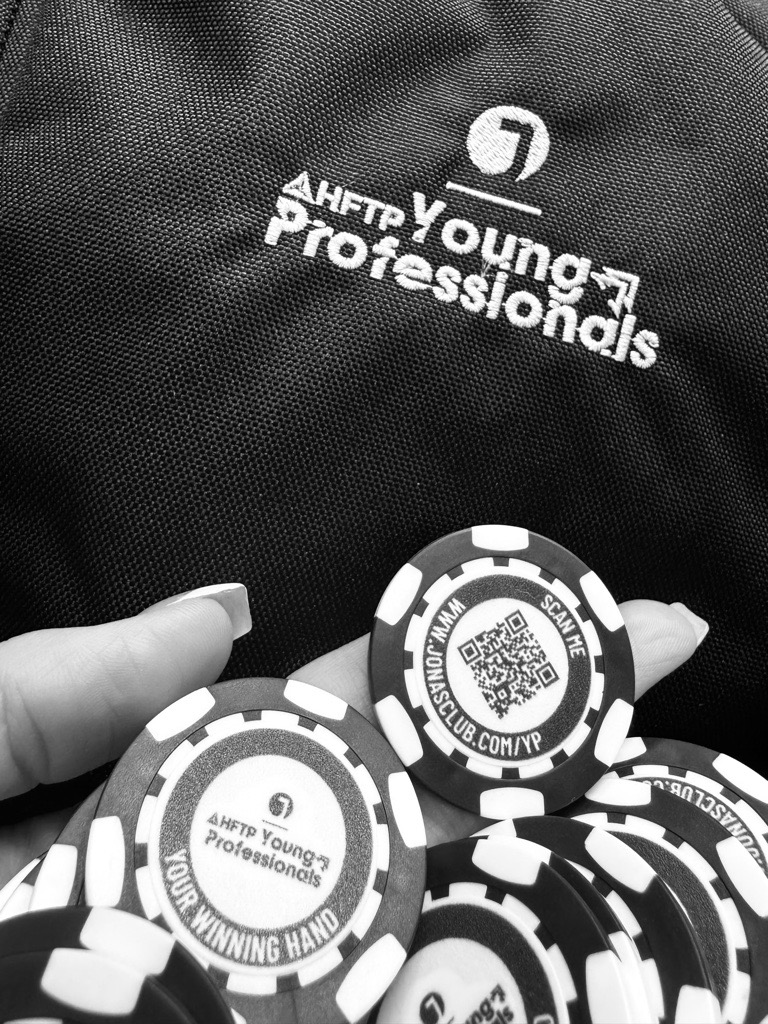 Co-branded Jonas x HFTP Young Professionals poker chip and Thule backpack